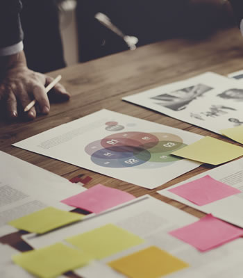 business papers spread out on table